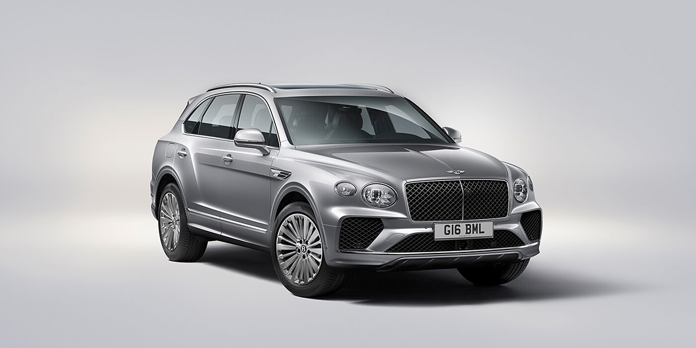 Bentley Zurich Bentley Bentayga luxury SUV front three quarter view in Moonbeam paint with matrix grille and 21″ 5 spoke painted wheels