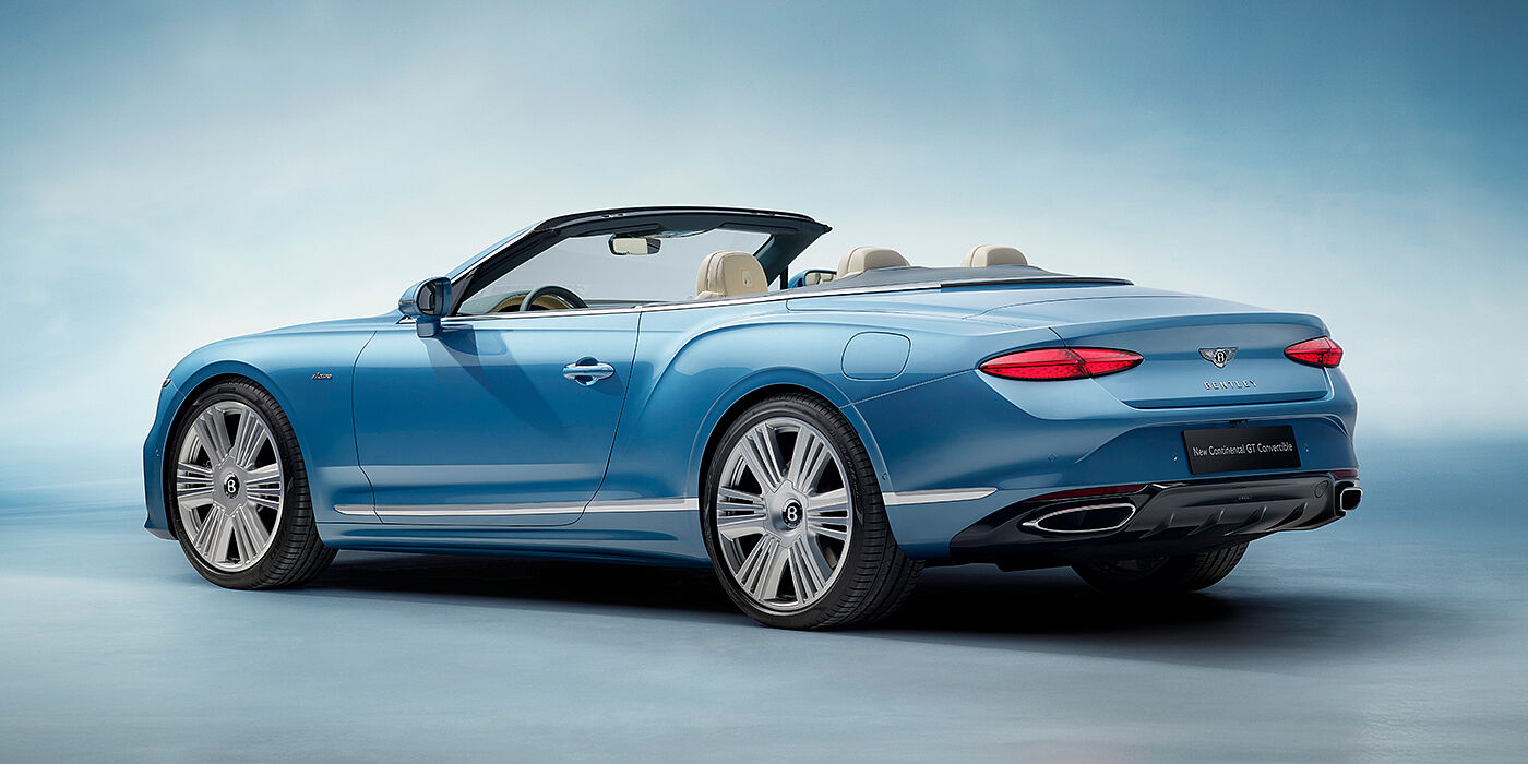 Bentley Zurich New Bentley Continental GTC Azure convertible rear view in Light Windsor blue paint with 22 inch ten spoke wheels and chrome exterior details