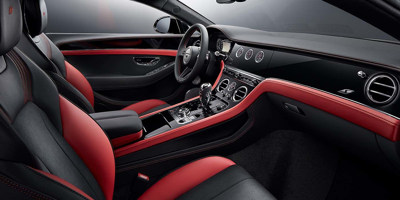 Bentley Zurich Bentley Continental GT S coupe front interior in Beluga black and Hotspur red hide with high gloss Carbon Fibre veneer