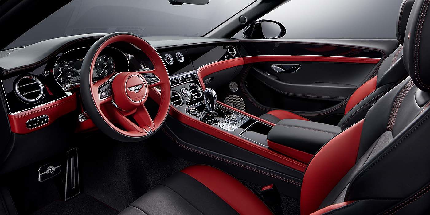 Bentley Zurich Bentley Continental GTC S convertible front interior in Beluga black and Hotspur red hide with high gloss carbon fibre veneer