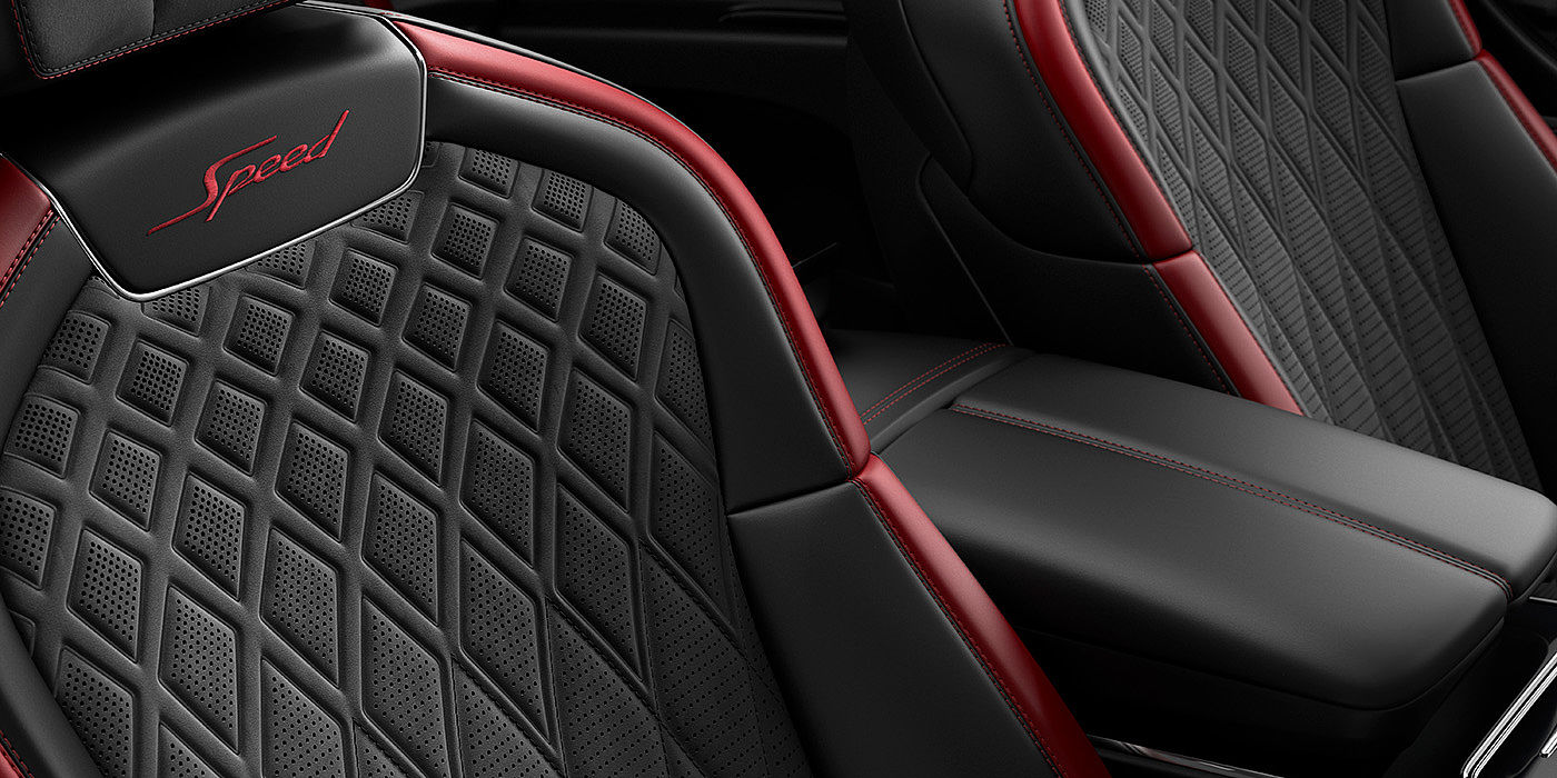 Bentley Zurich Bentley Flying Spur Speed sedan seat stitching detail in Beluga black and Cricket Ball red hide