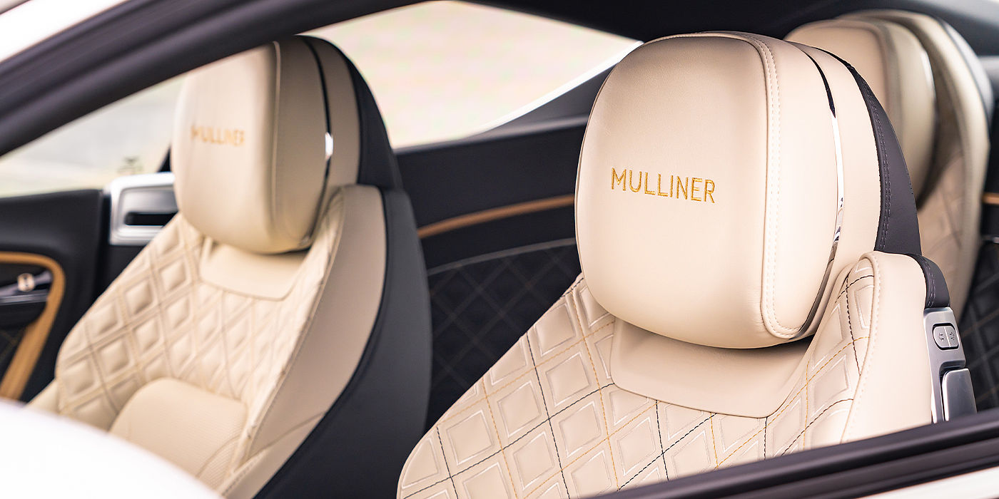 Bentley Zurich Bentley Continental GT Mulliner coupe seat detail in Beluga black and Linen hide