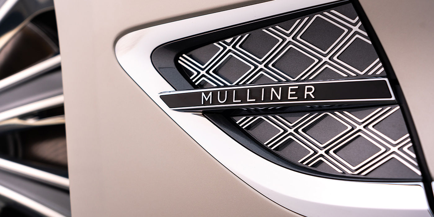 Bentley Zurich Bentley Continental GT Mulliner coupe in White Sand paint Mulliner wing vent close up