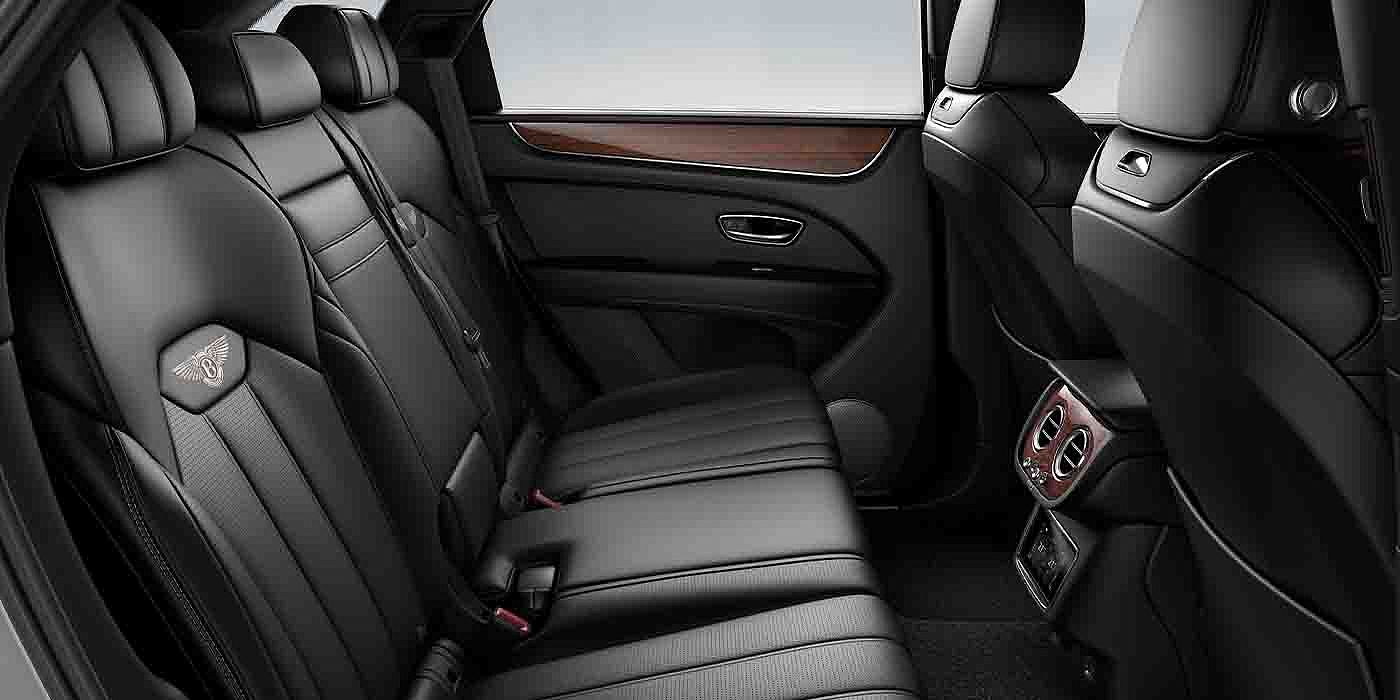 Bentley Zurich Bentley Bentayga EWB interior view for rear passengers with Beluga black hide.
