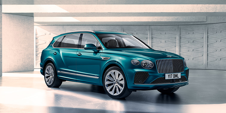 Bentley Zurich Bentley Bentayga Extended Wheelbase Azure SUV front three quarter in Topaz blue paint colour with a grey background