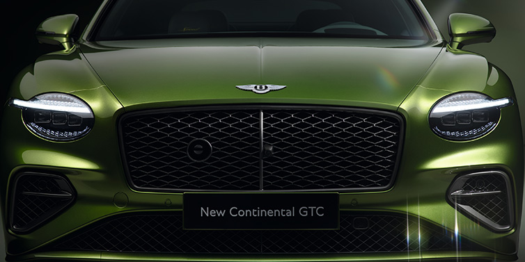 Bentley Zurich Bentley Continental GTC Speed convertible front bonnet detail in Tourmaline Green paint showing new light design