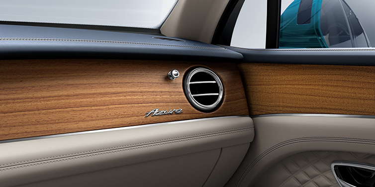 Bentley Zurich Bentley Bentayga Extended Wheelbase Azure front dash showing Open Pore Koa veneer surrounded by Portland and Imperial Blue hides