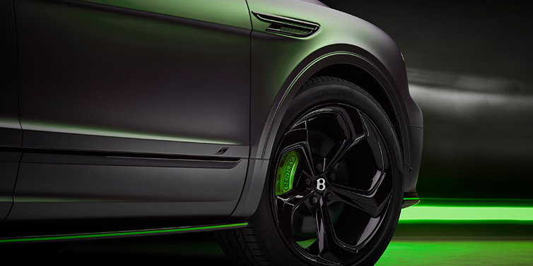 Bentley Zurich Bentley Bentayga S Black Edition SUV exterior wheel detail with Cyber Green brakes with Anthracite Satin paint